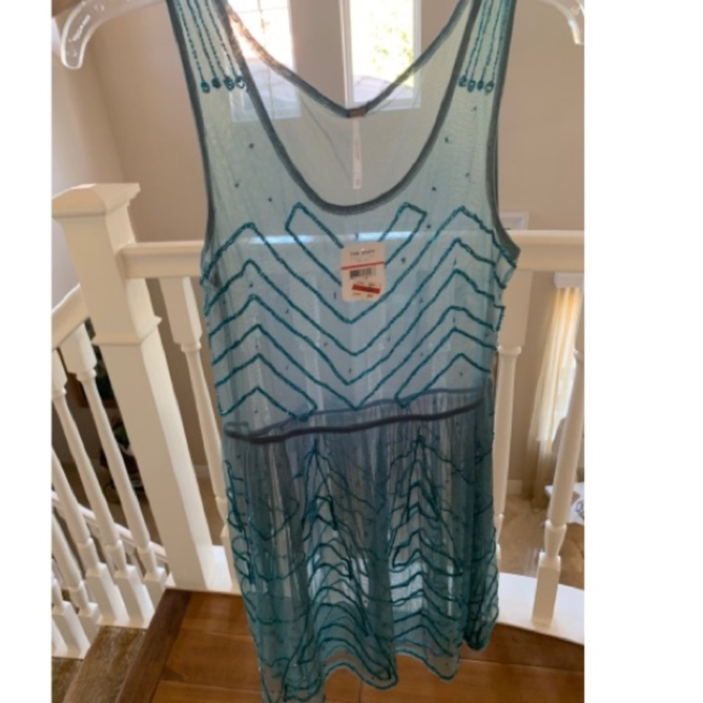 Free people dress tags on